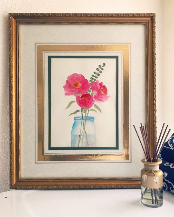 pink flowers in mason jar